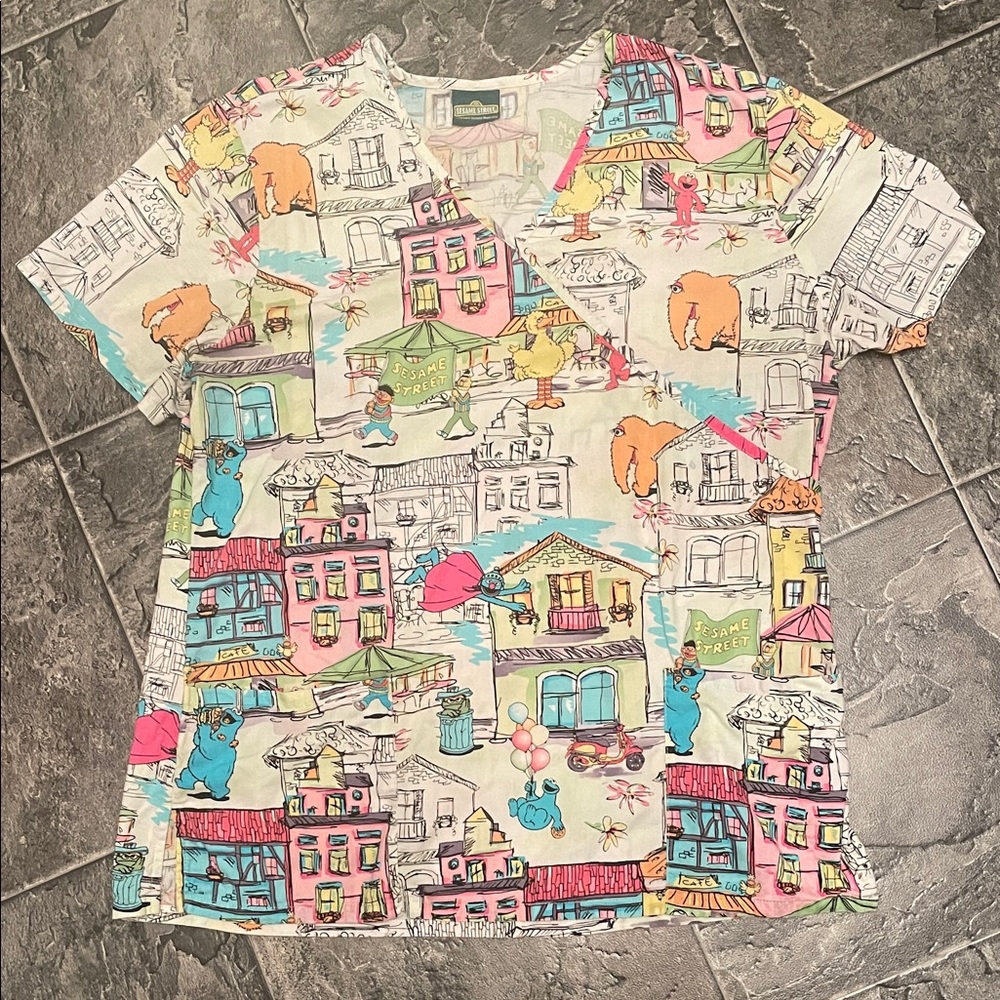 SESAME STREET Scrub Top Ladies Pastel Retro Character Graphic Soft Cheerful Fun